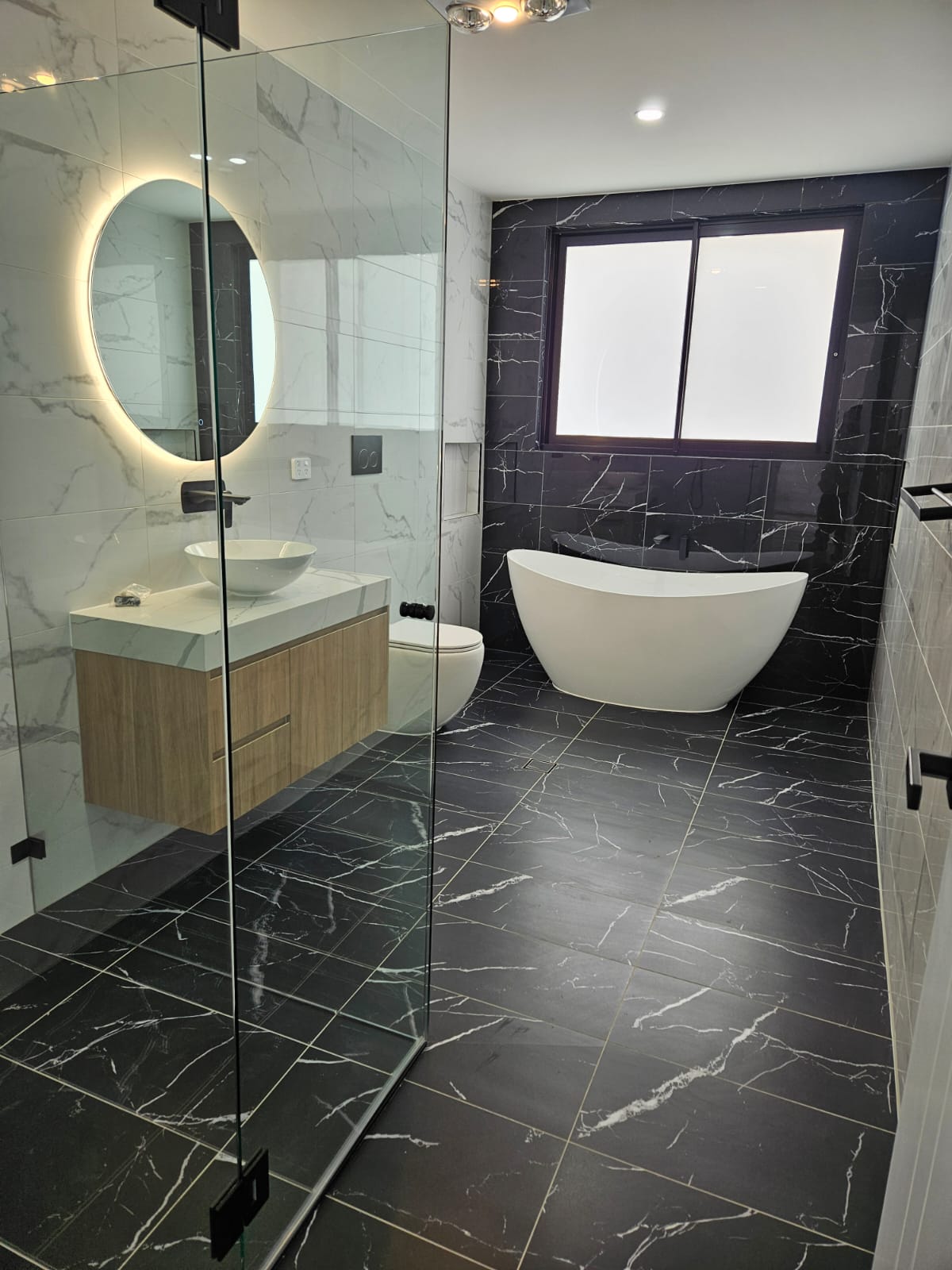 Bathroom & laundry project by Desi Building Solutions